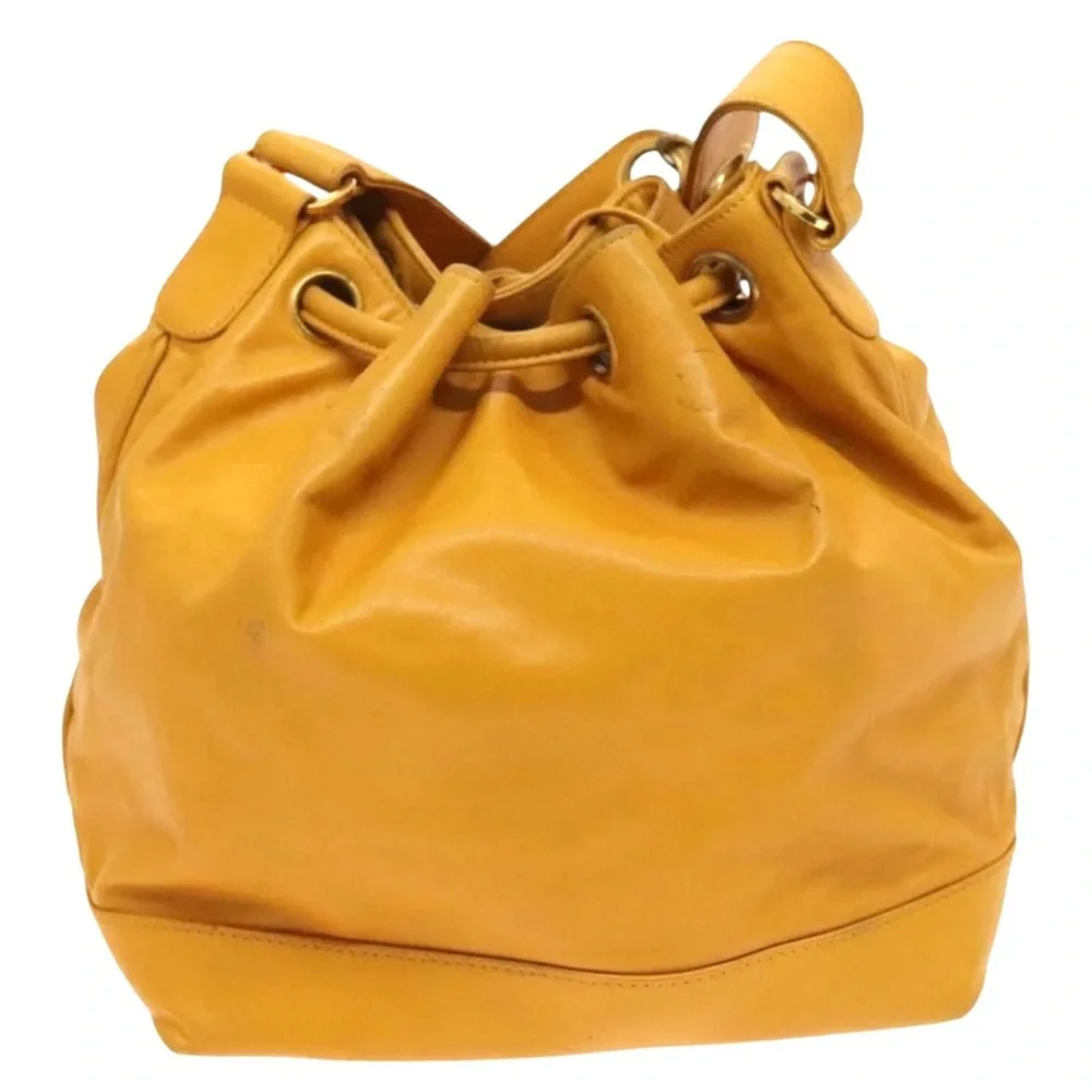 Authentic CHANEL yellow lambskin bucket bag with wallet pouch